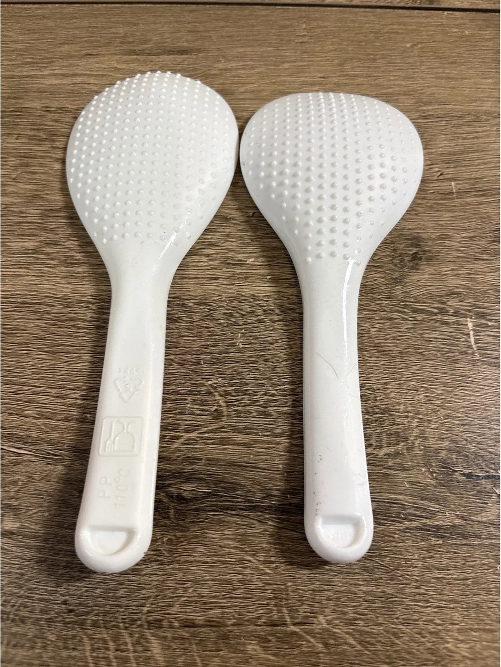 Set of 2 White Plastic Rice Spoons with Textured Heads
